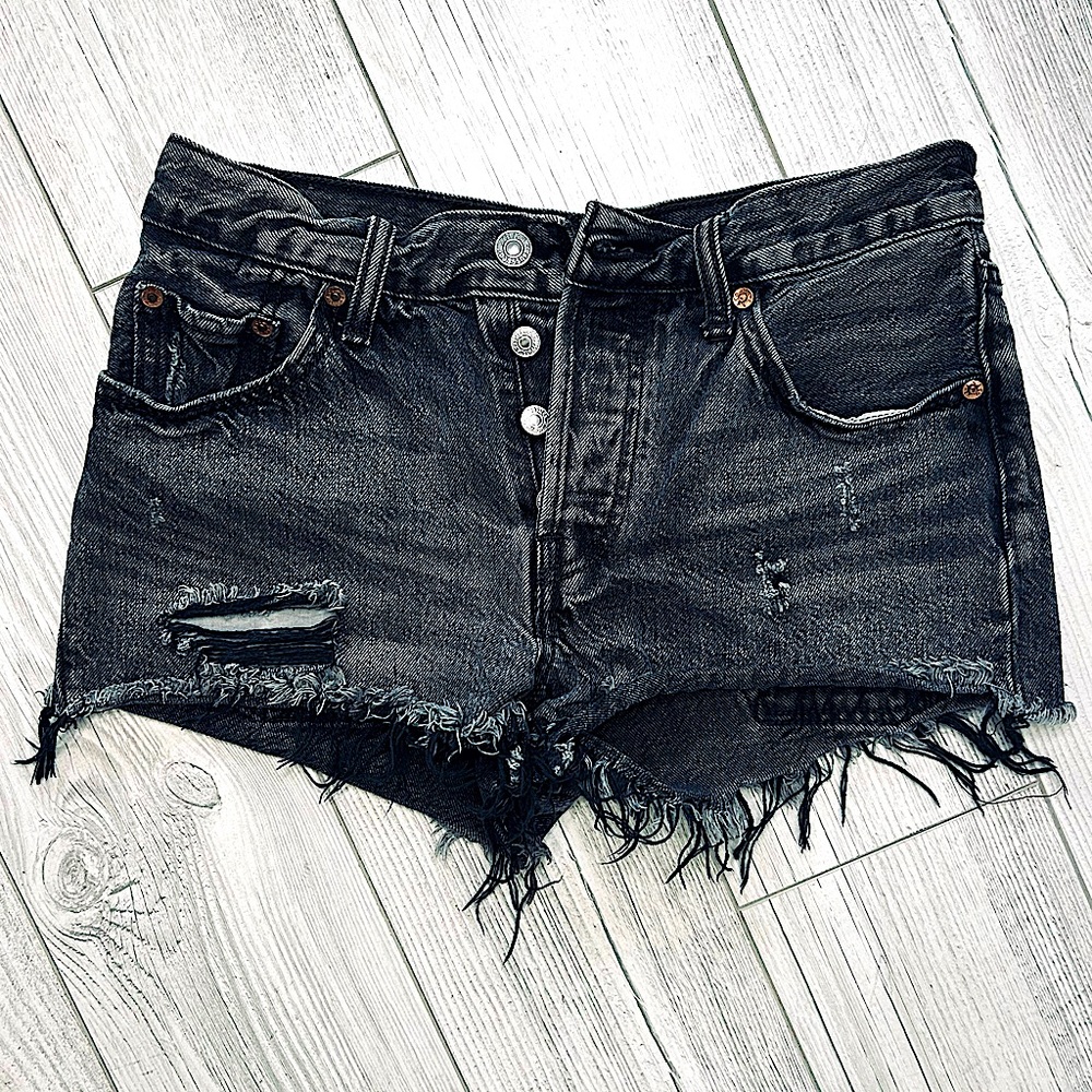 Levi’s dark wash distressed cut off denim shorts
